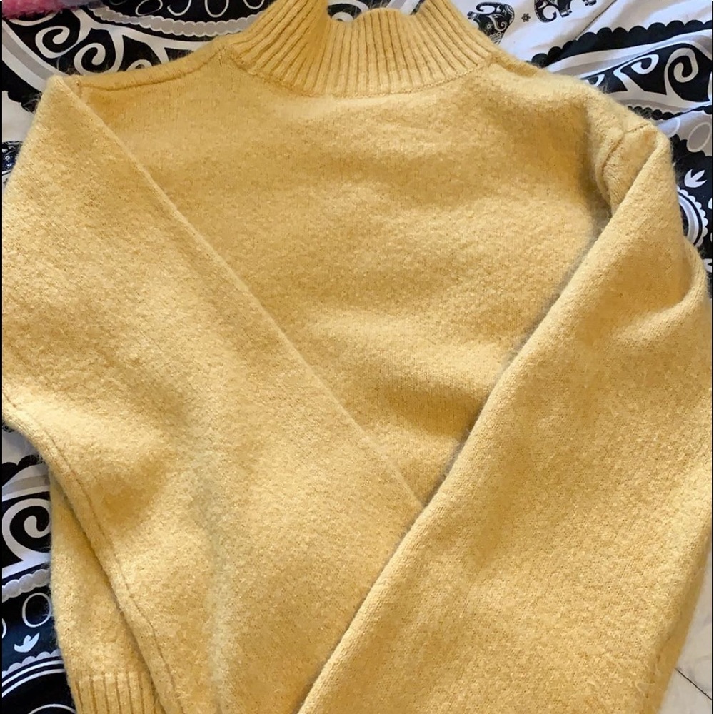 yellow sweater